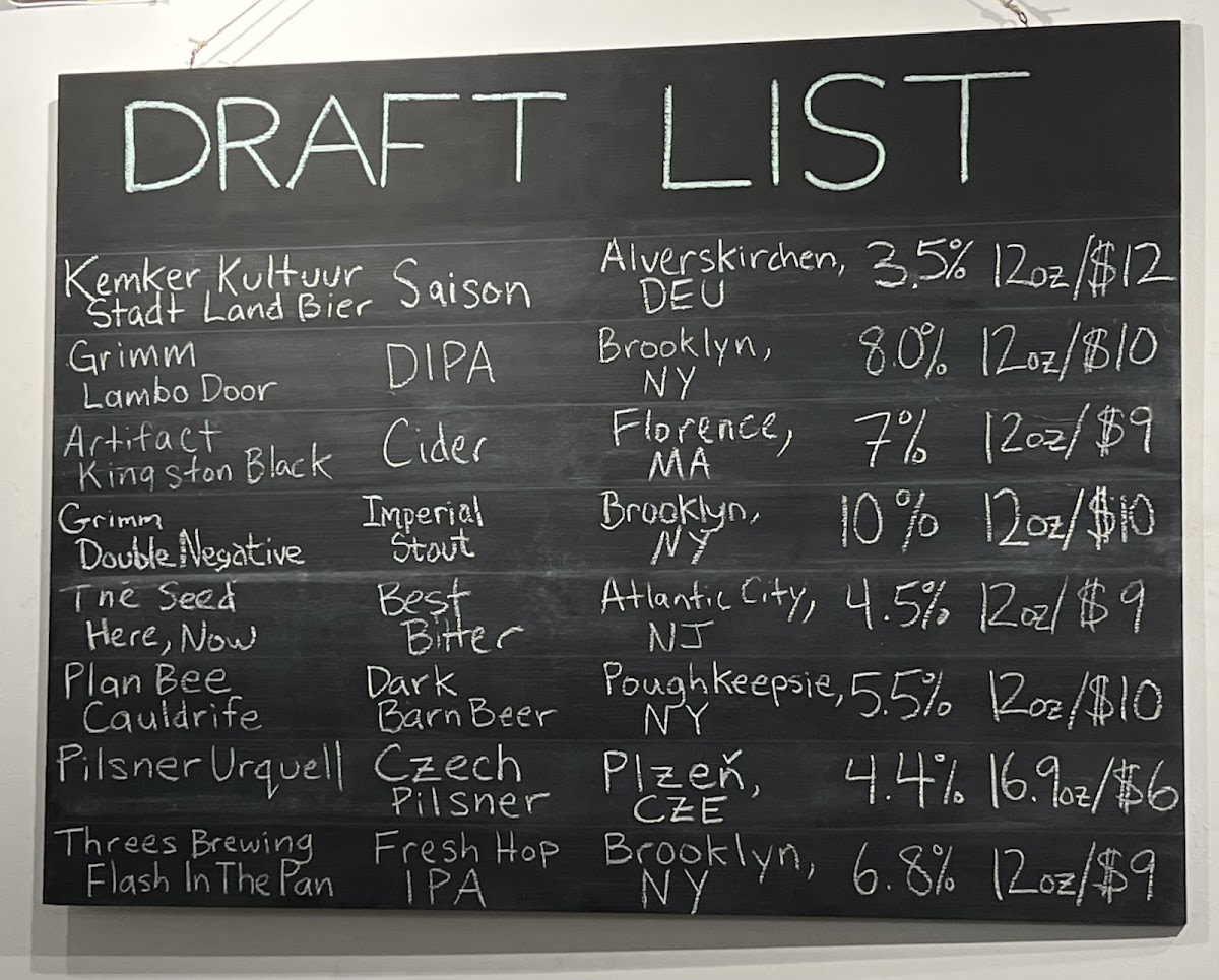 Here Coffee Beer menu board