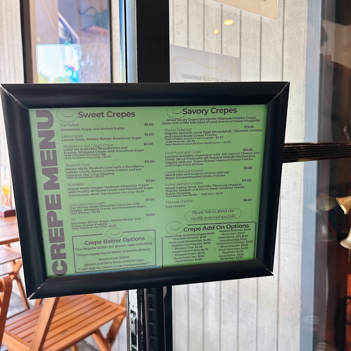 The Naked Crepe Cafe menu board