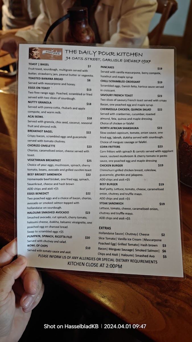 The Daily Pour Kitchen menu board