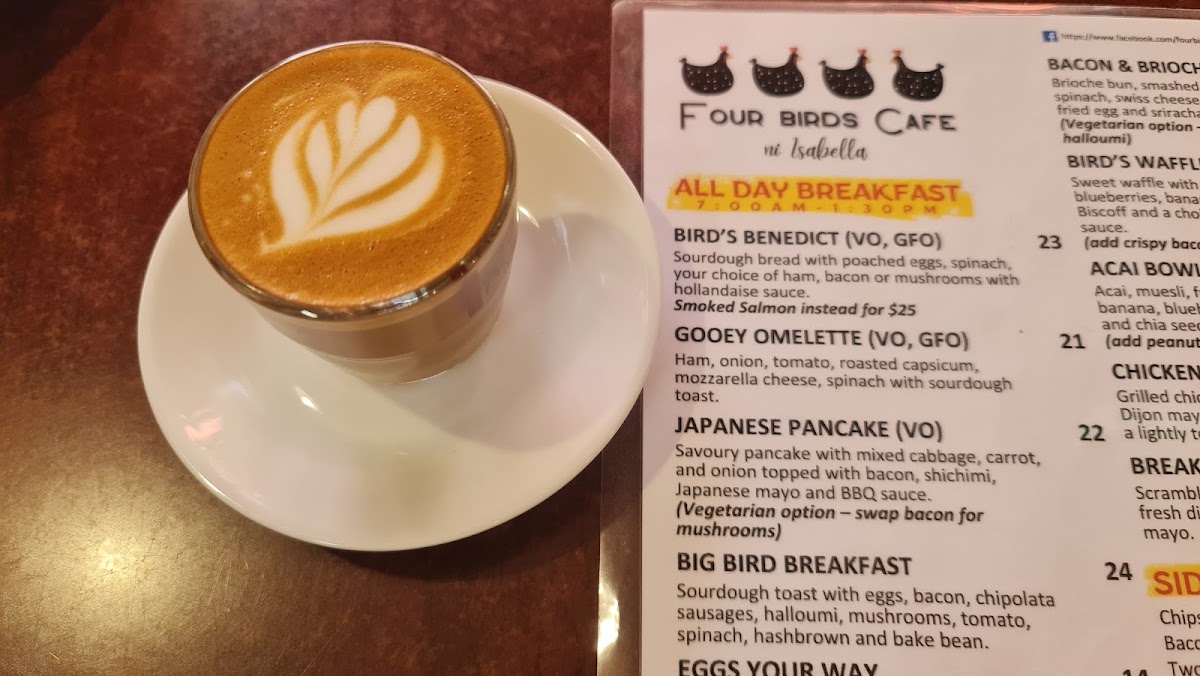 Four Birds menu board