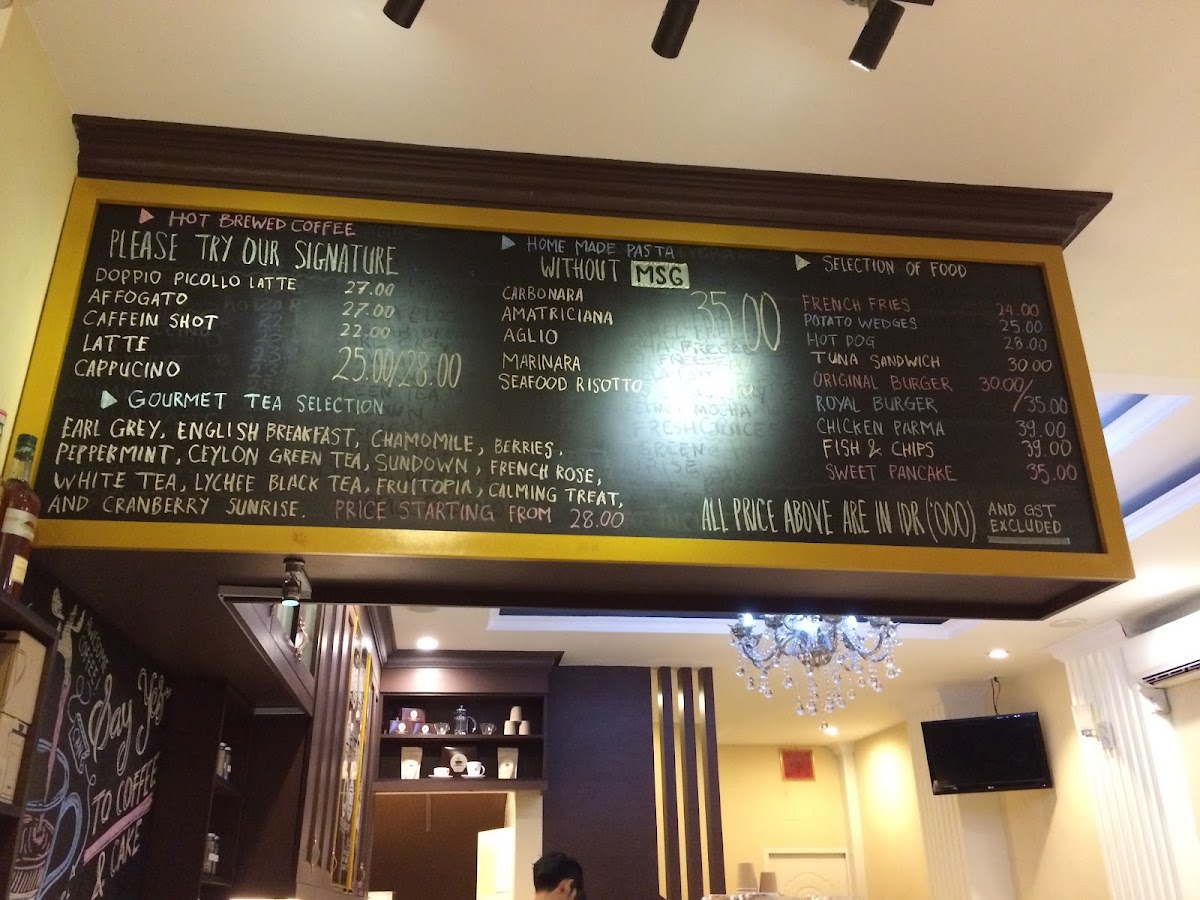 Caffein Coffee & Cake menu board