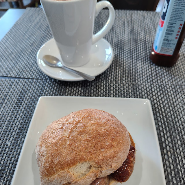Sausage Bun and Cappuccino Coffee
