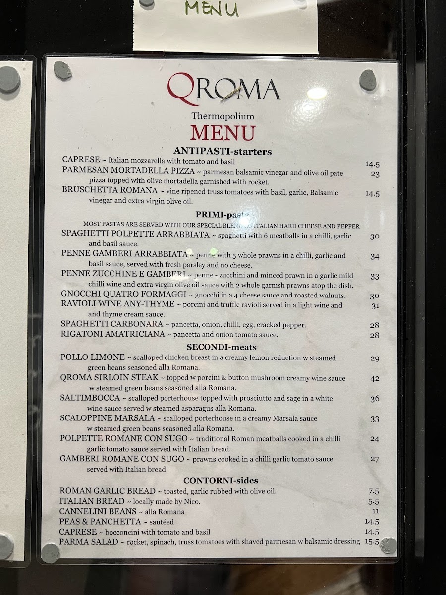 QROMA Cafe and Bar menu board