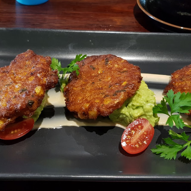 Corn Fritters on Smashed Avocado
