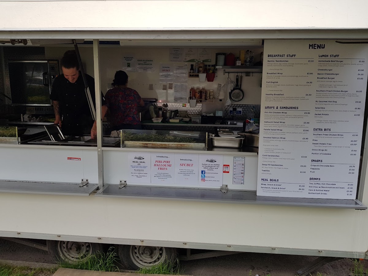Que Delicia menu board