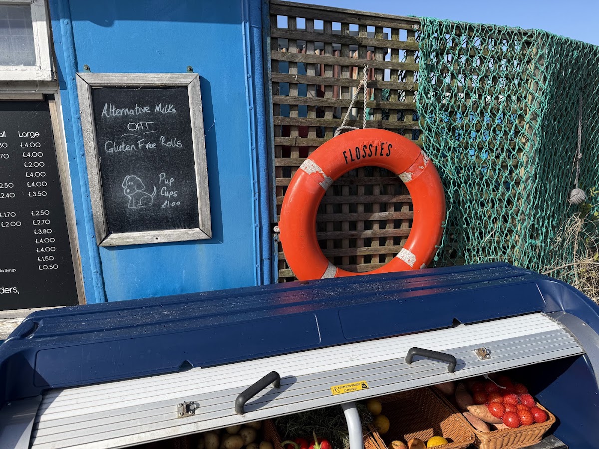 Flossies beach store menu board