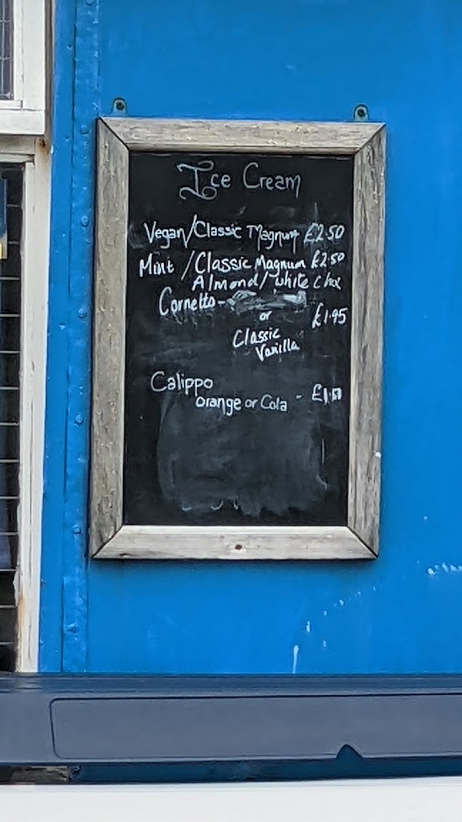 Flossies beach store menu board
