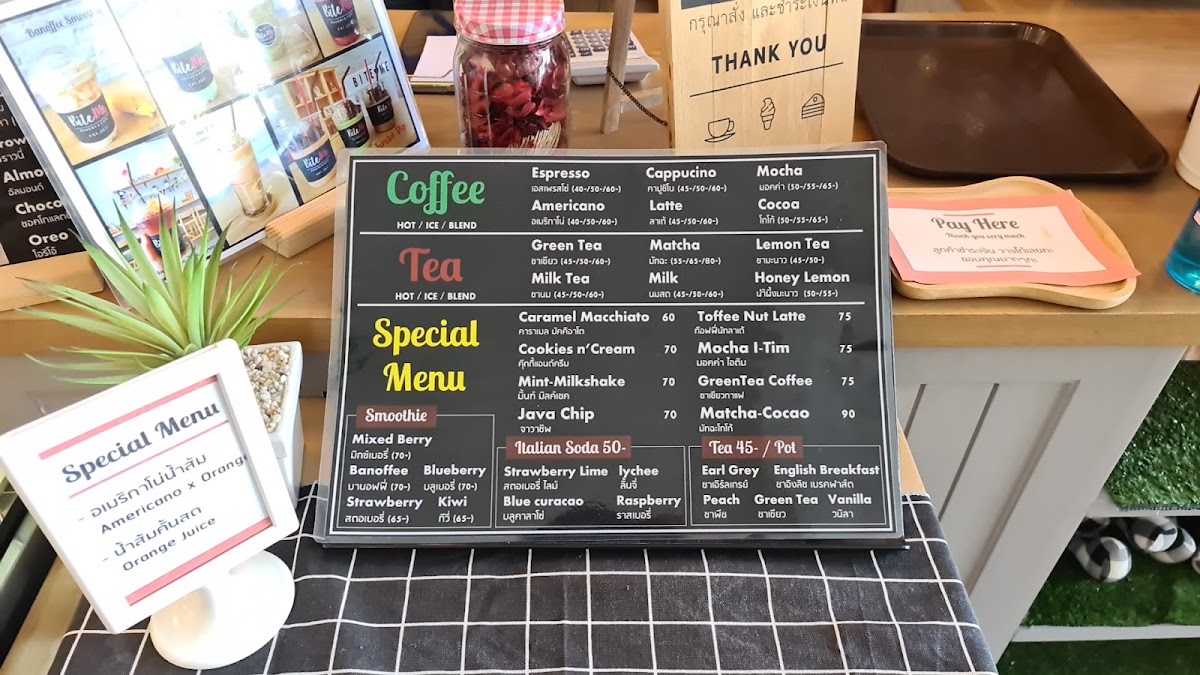 Bite Me Bakery & Cafe' menu board