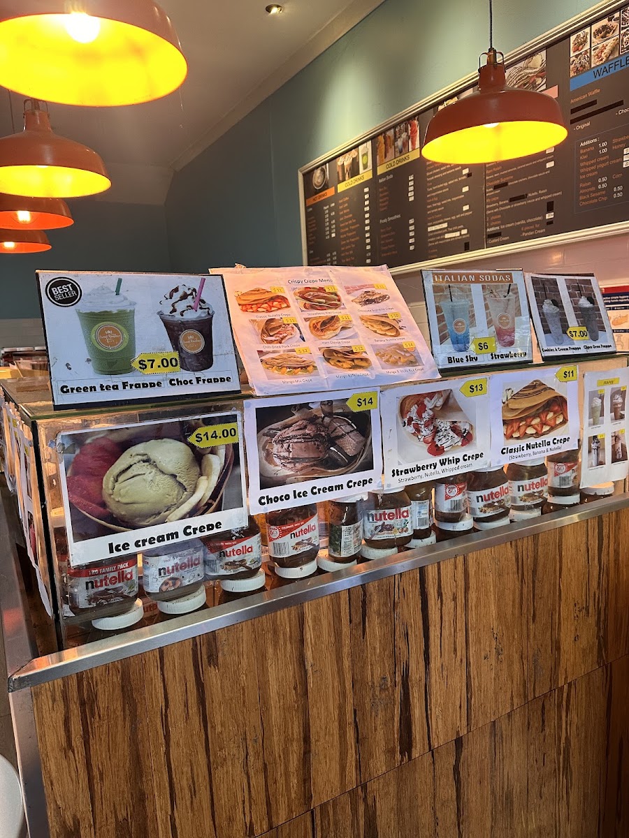 Sweet Rainbow Cafe menu board