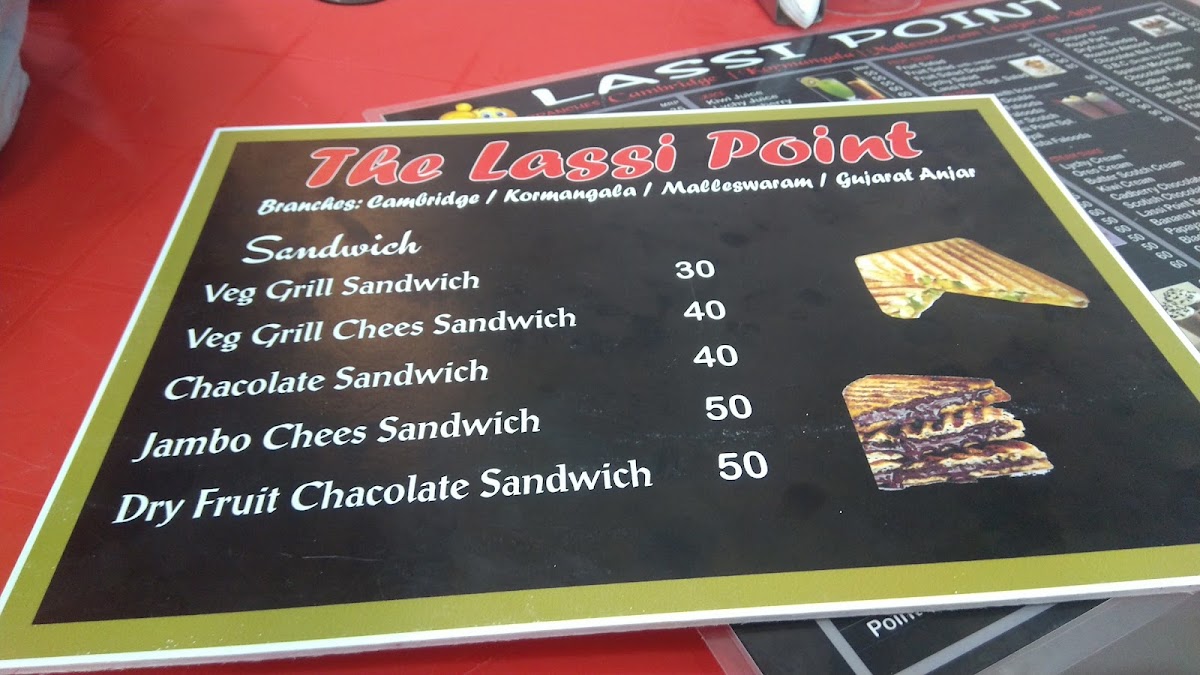 Friends Cafe & The Lassi Point menu board