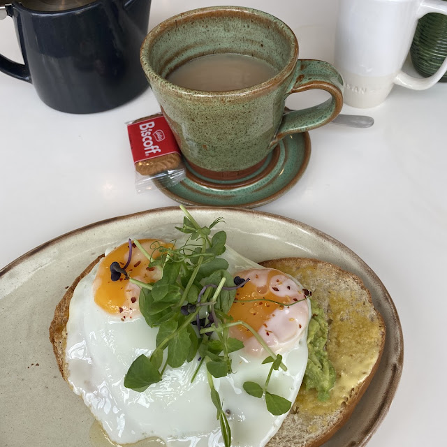 Fried Eggs and Avocado on Toasted Bagel
