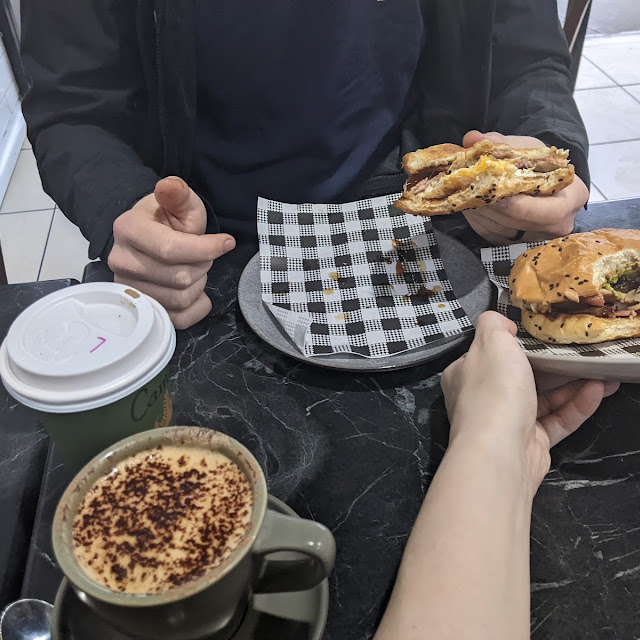 Cappuccino and Bacon and Egg Rolls