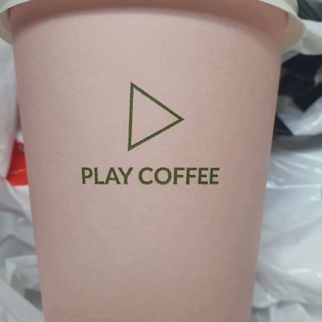 Cappuccino in a Takeaway Cup