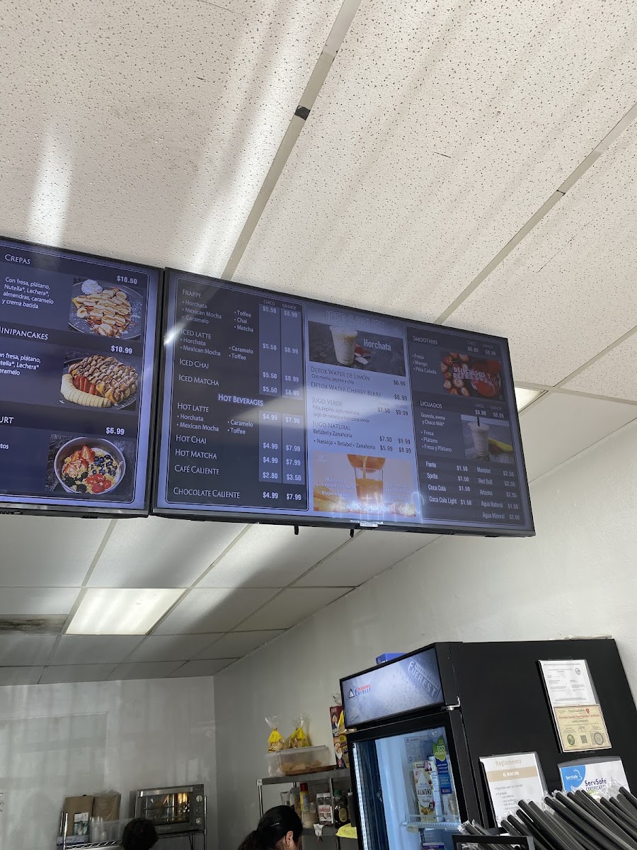 El Rincon La Chulis menu board