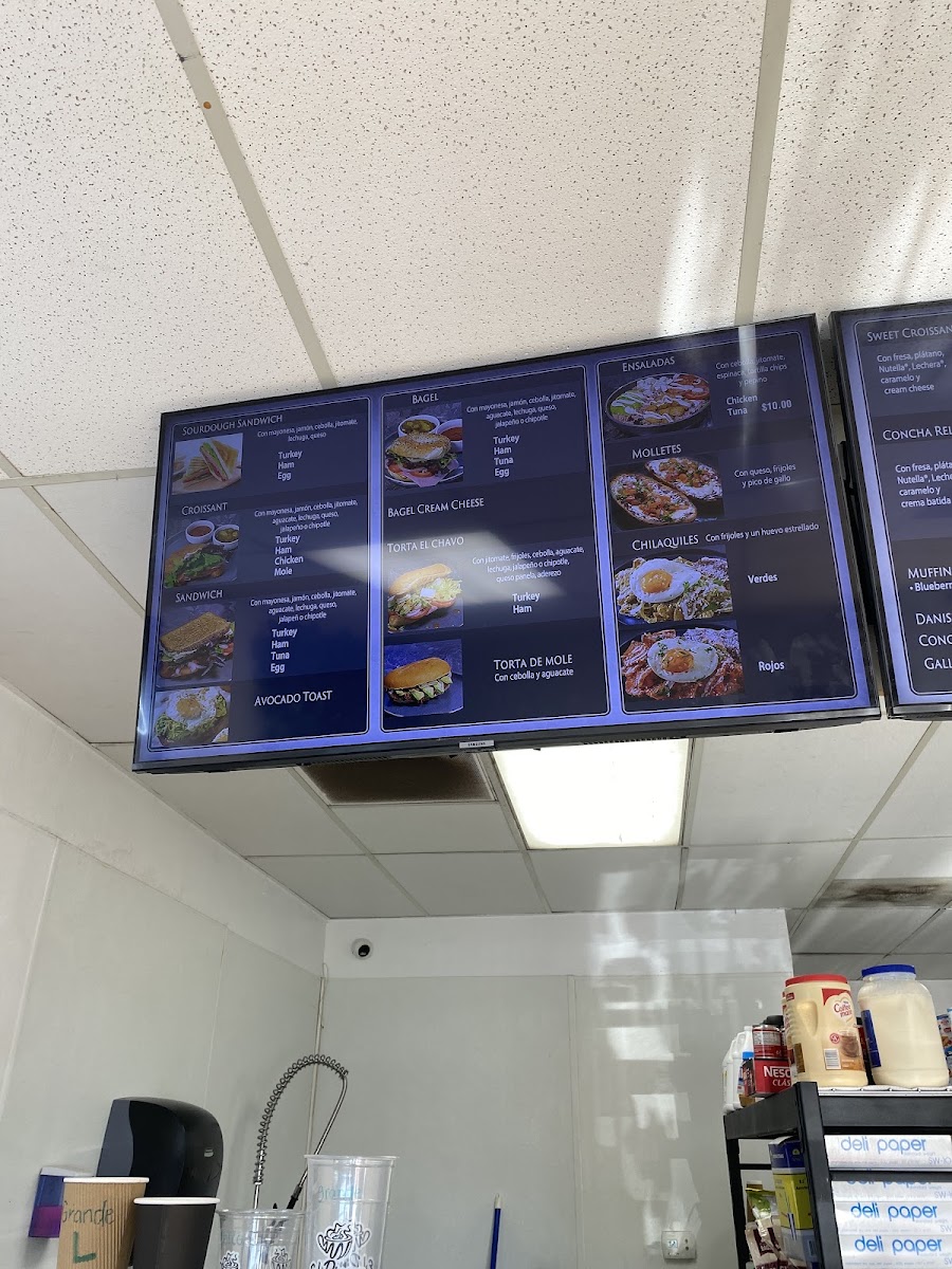 El Rincon La Chulis menu board
