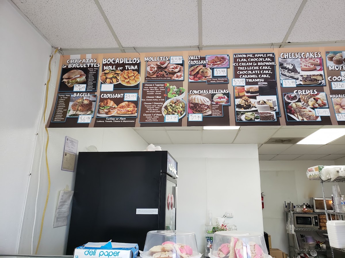 El Rincon La Chulis menu board