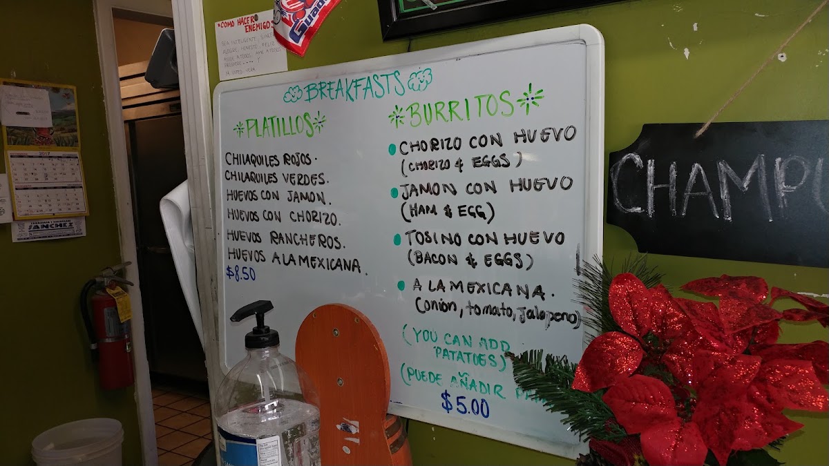 Casa de sanchez panadería y restaurante menu board