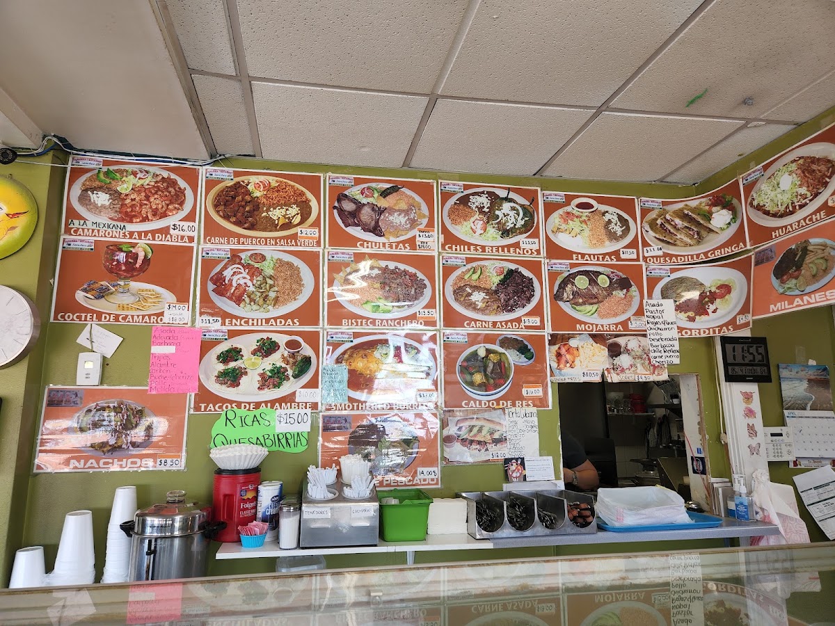 Casa de sanchez panadería y restaurante menu board