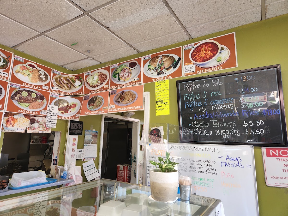 Casa de sanchez panadería y restaurante menu board