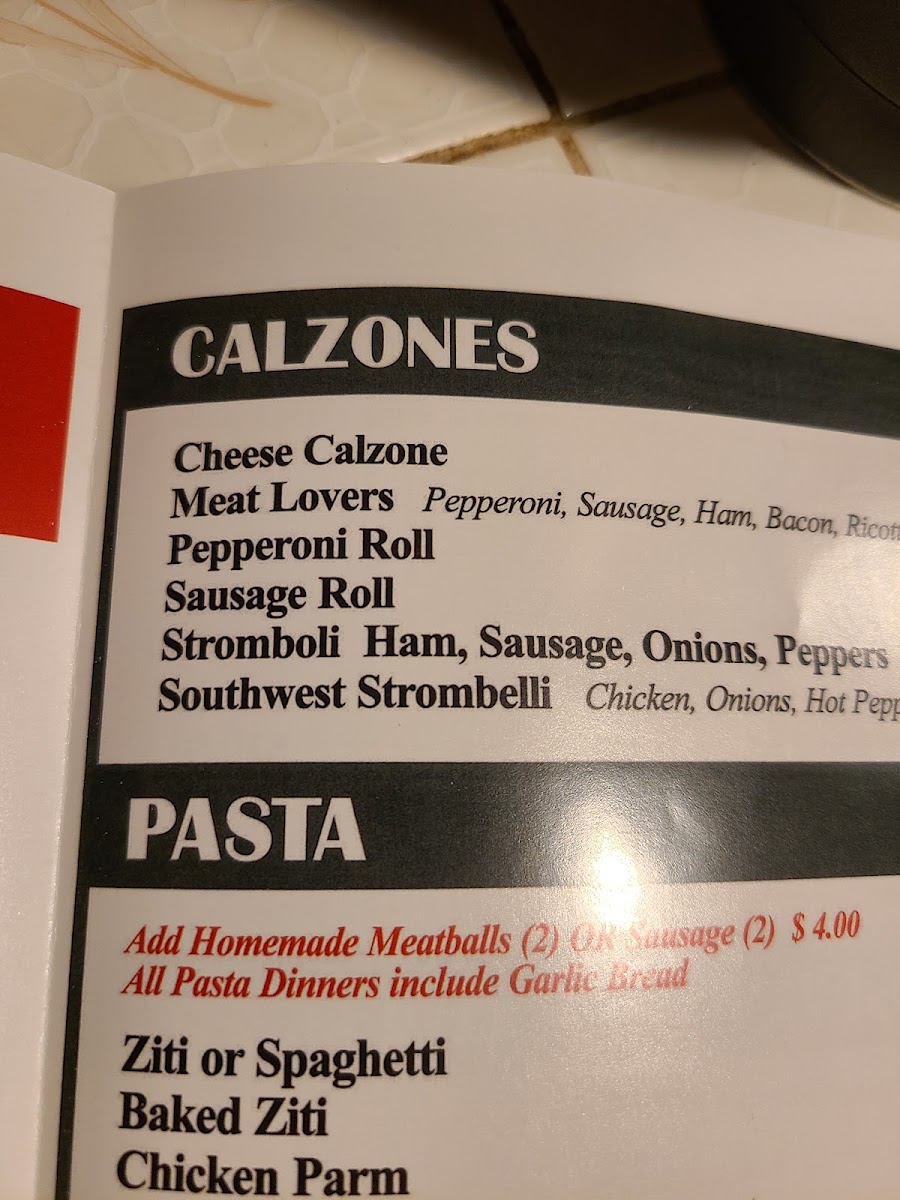 Vicki's Pizzeria menu board