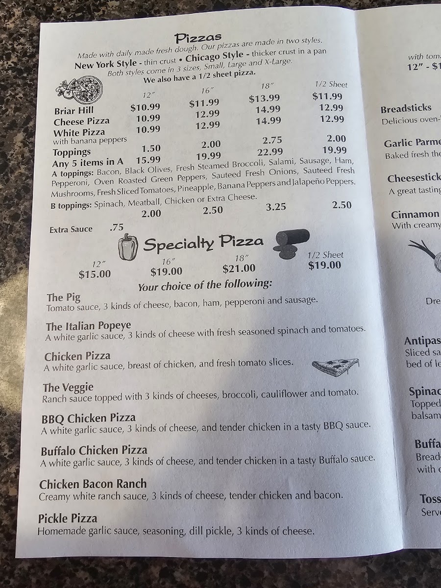 Stone Age Pizza menu board