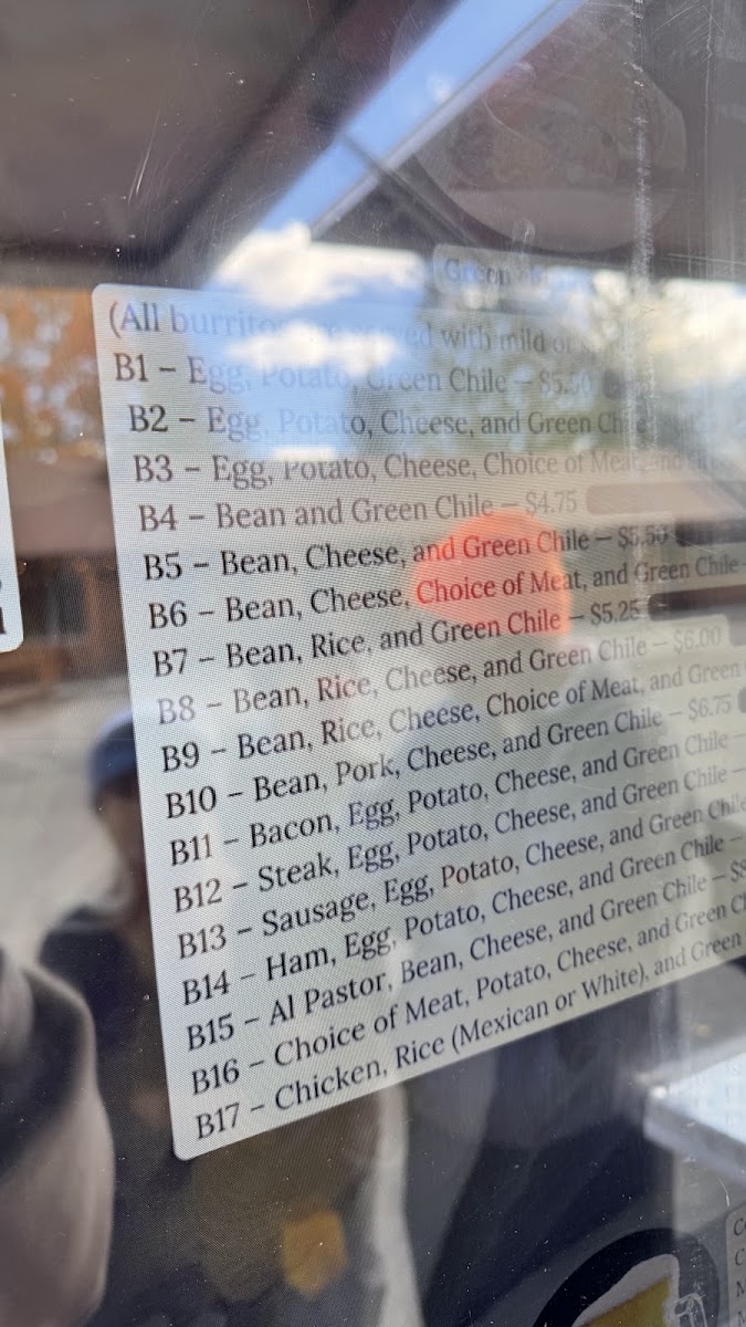 Taco About It menu board