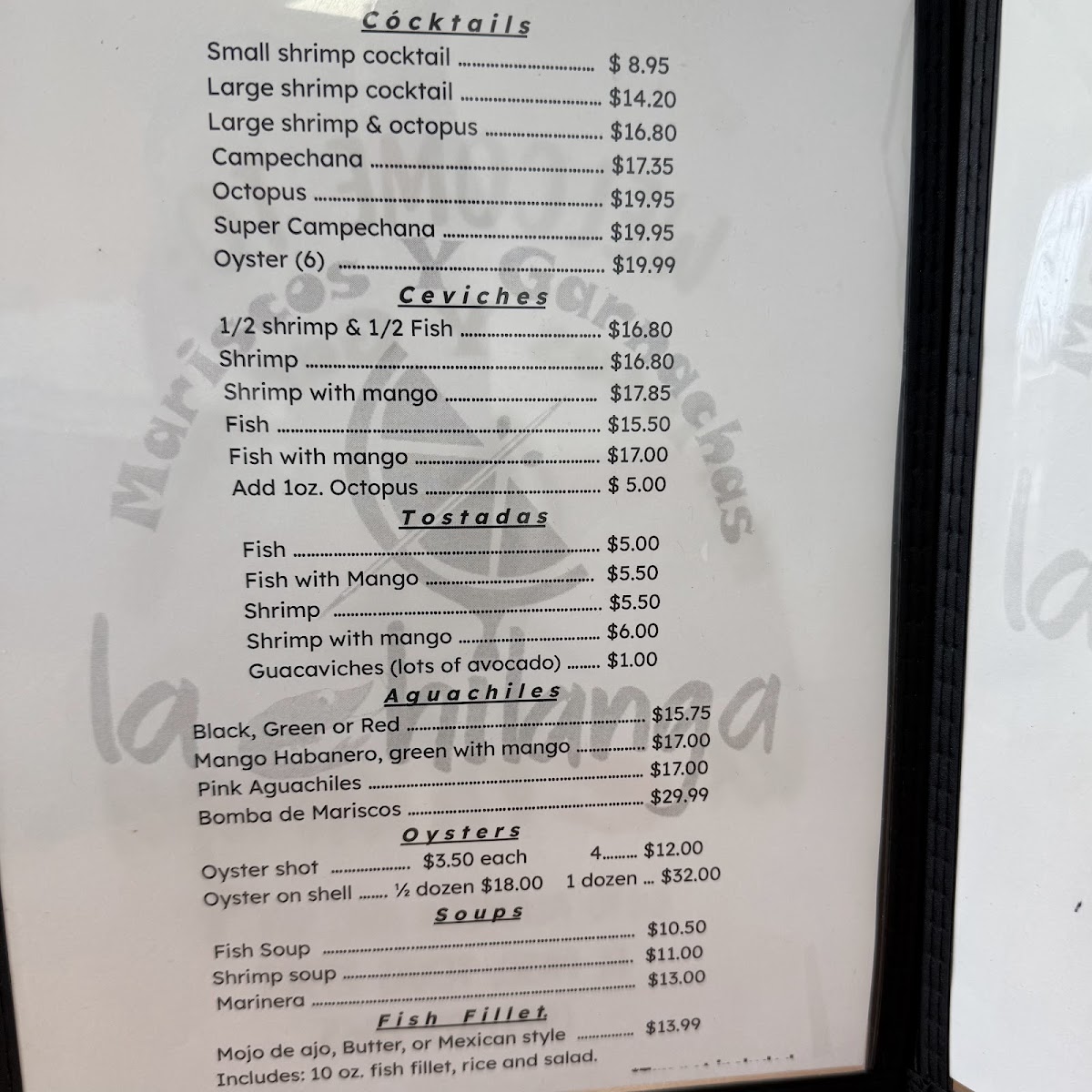Mariscos y Garnachas La Chilanga (food truck) menu board