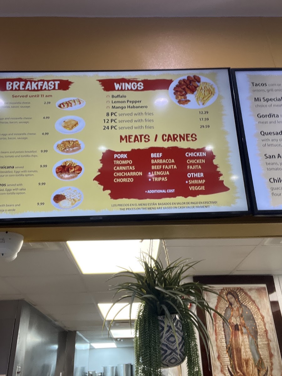 Taqueria El Arquito menu board