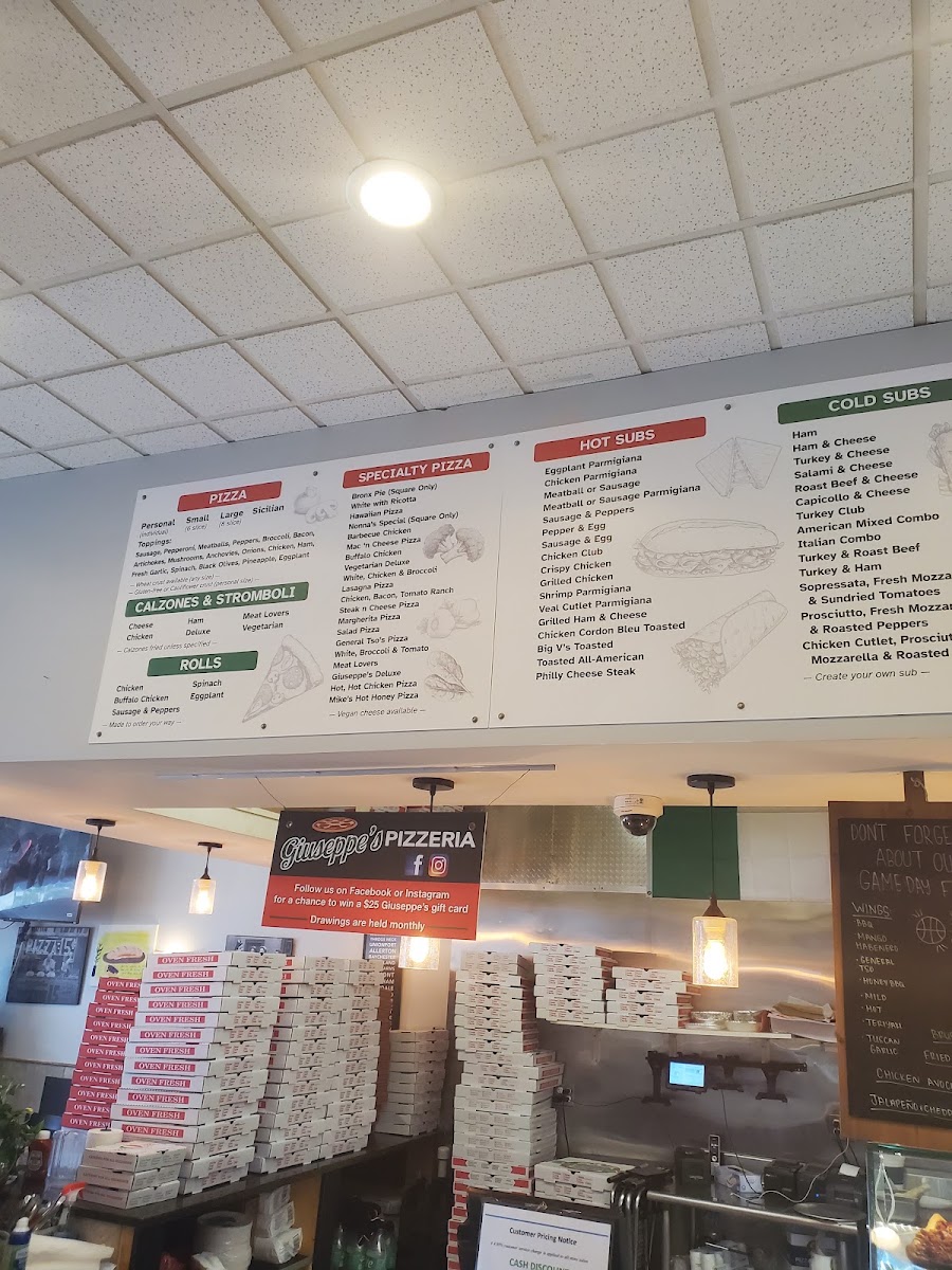 Giuseppe's Pizzeria & Restaurant menu board