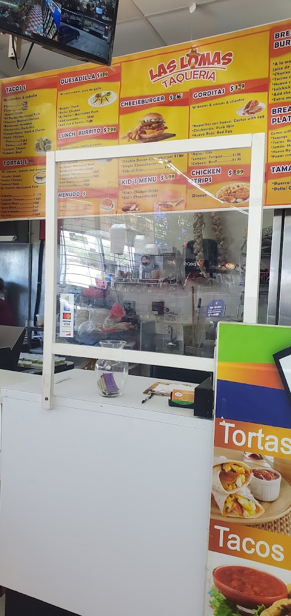 Las Lomas Taqueria menu board