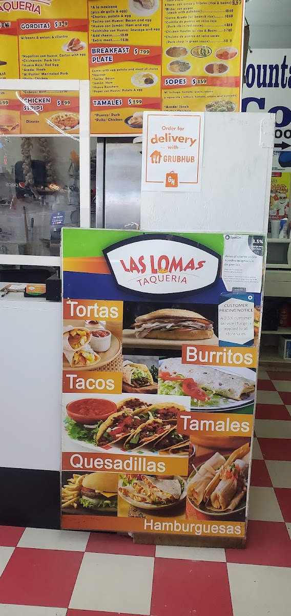 Las Lomas Taqueria menu board