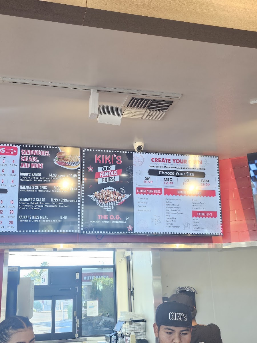 Kasi’s Chicken & Fries menu board
