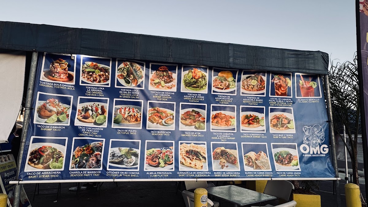Marisco's German Sea Food menu board