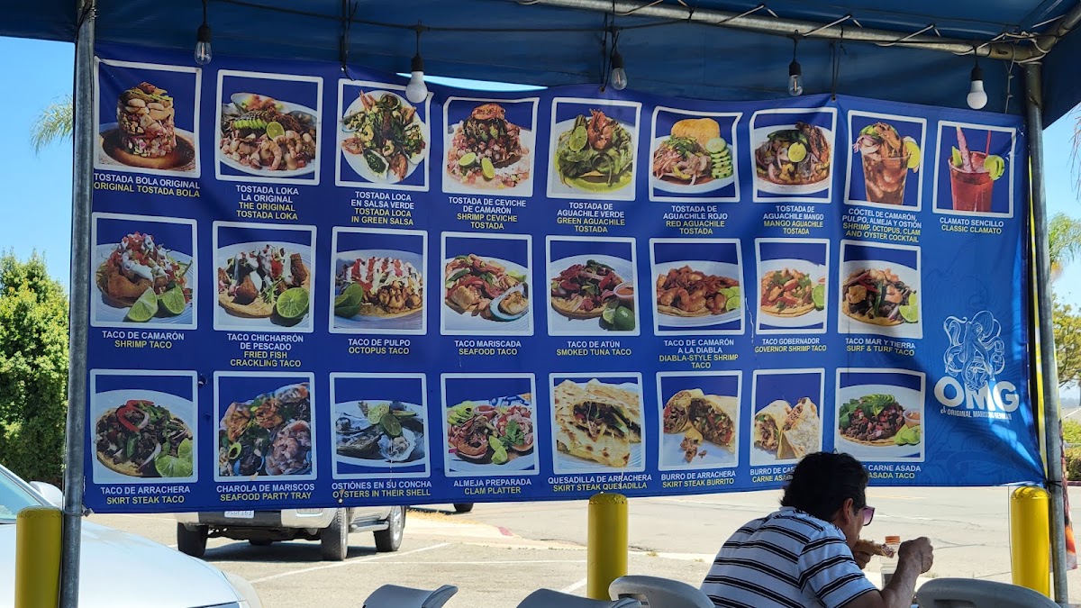 Marisco's German Sea Food menu board