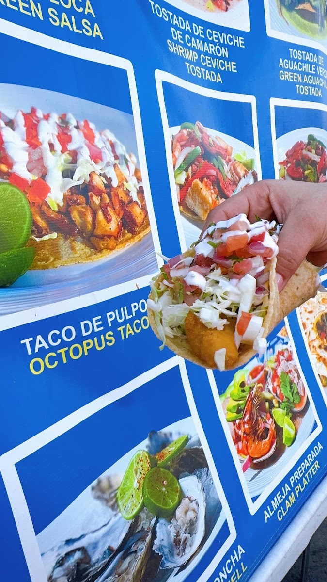 Marisco's German Sea Food menu board