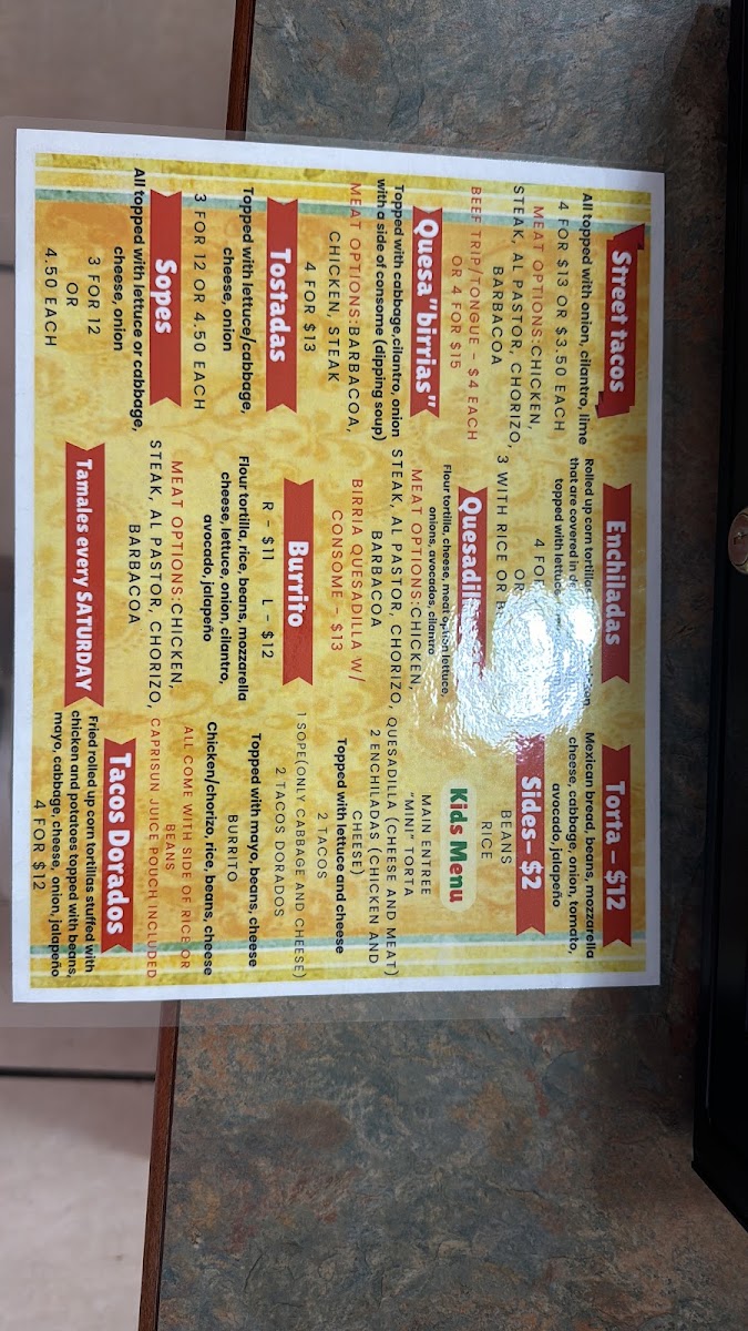 La Oaxaqueña Mexican Food LLC menu board