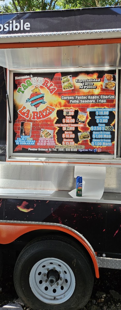 Taqueria La Raza menu board