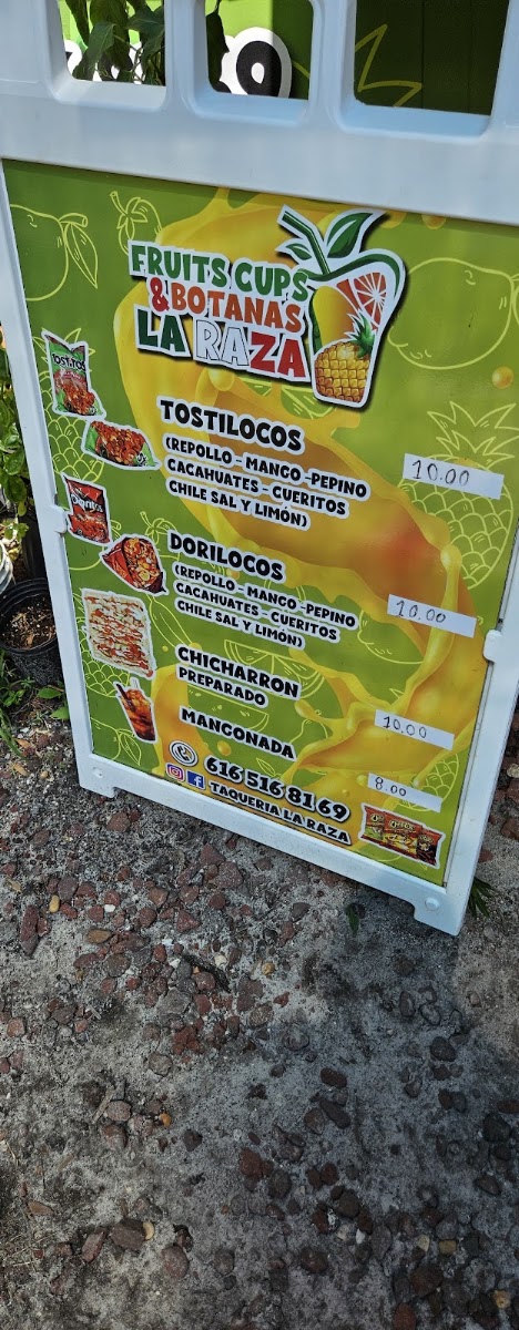 Taqueria La Raza menu board
