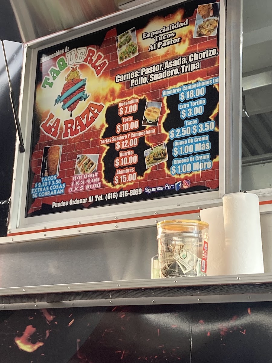 Taqueria La Raza menu board