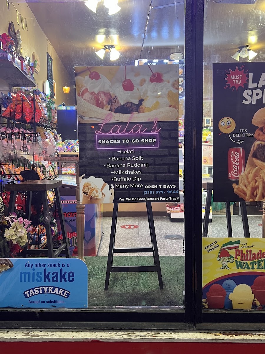 Lala's Snacks To Go Shop menu board