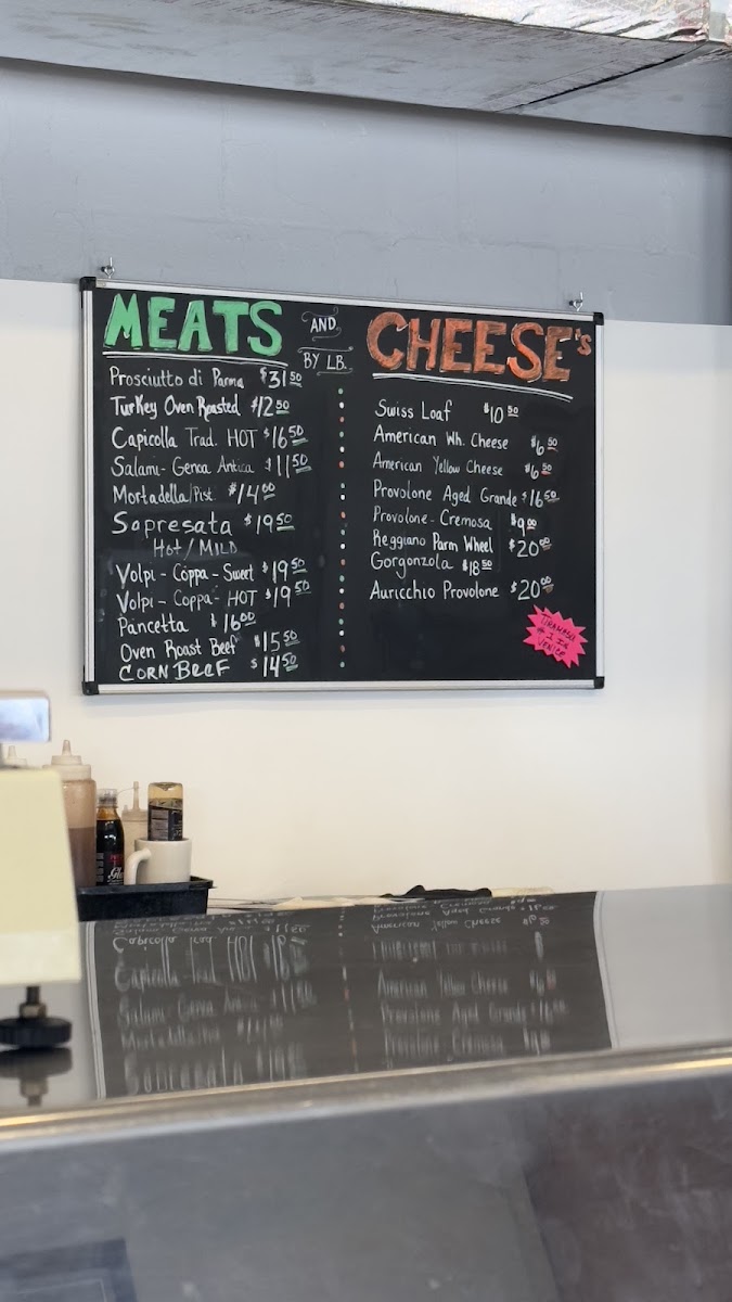 Abondanza Italian Deli menu board
