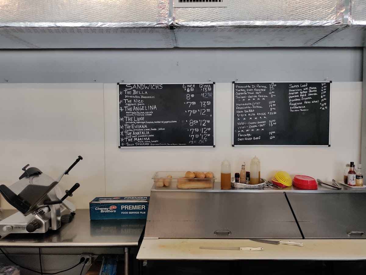 Abondanza Italian Deli menu board