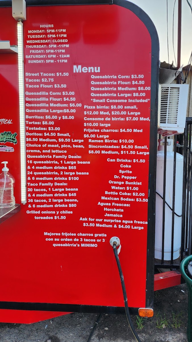 Luz's Pinches Tacos menu board