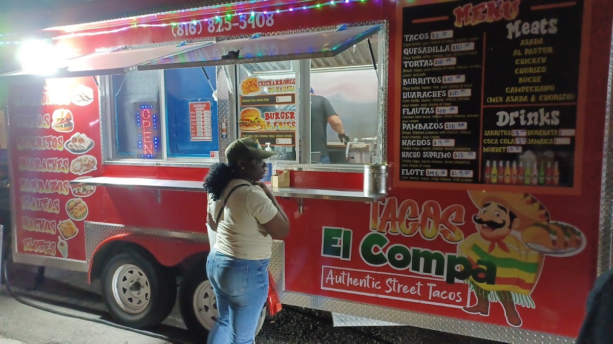 Tacos El Compa menu board