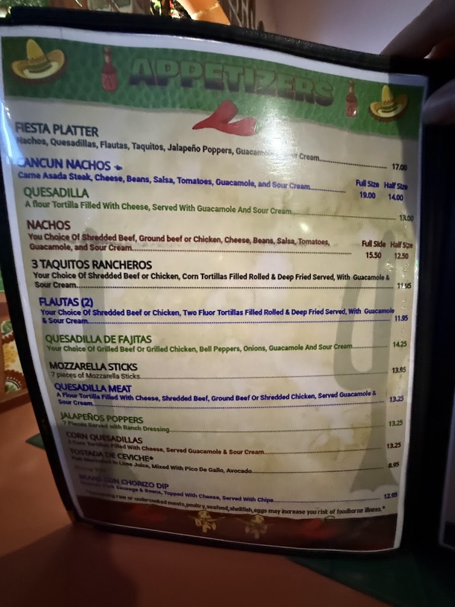 Cancun Mexican Restaurant and seafood menu board