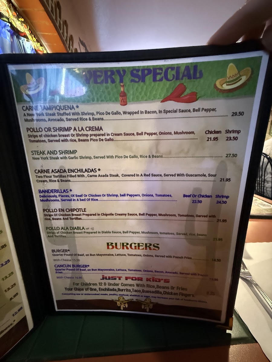 Cancun Mexican Restaurant and seafood menu board