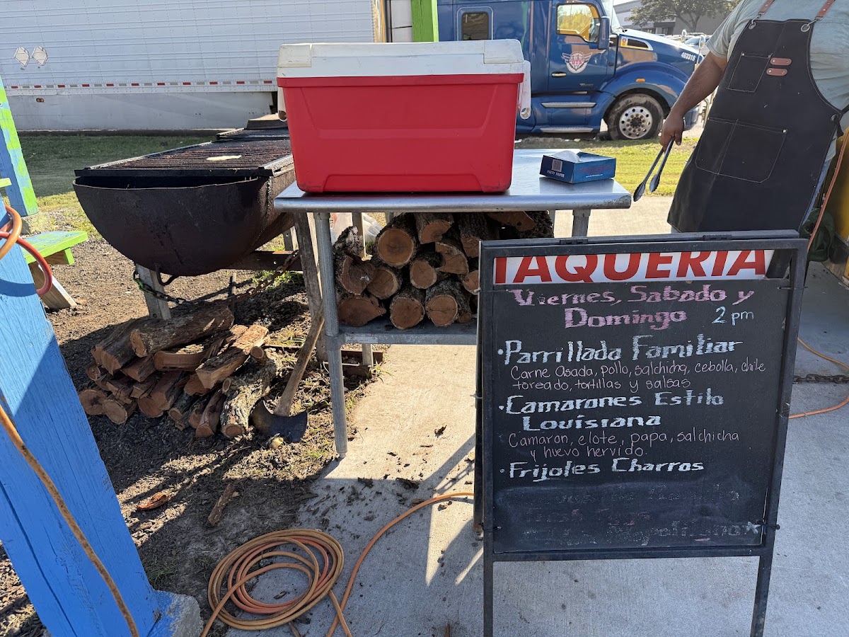 Las Brasas del Sabor menu board