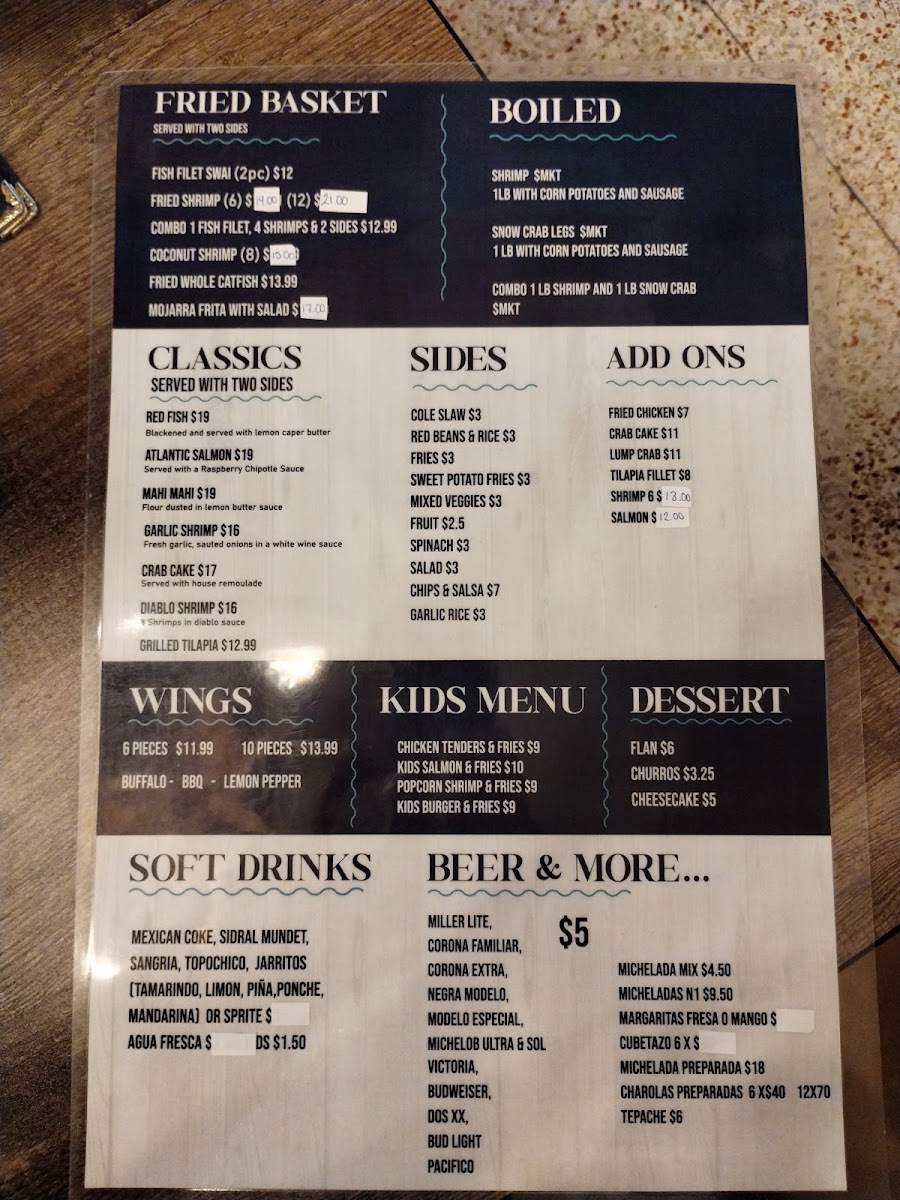 Birrieria Aguinaga menu board