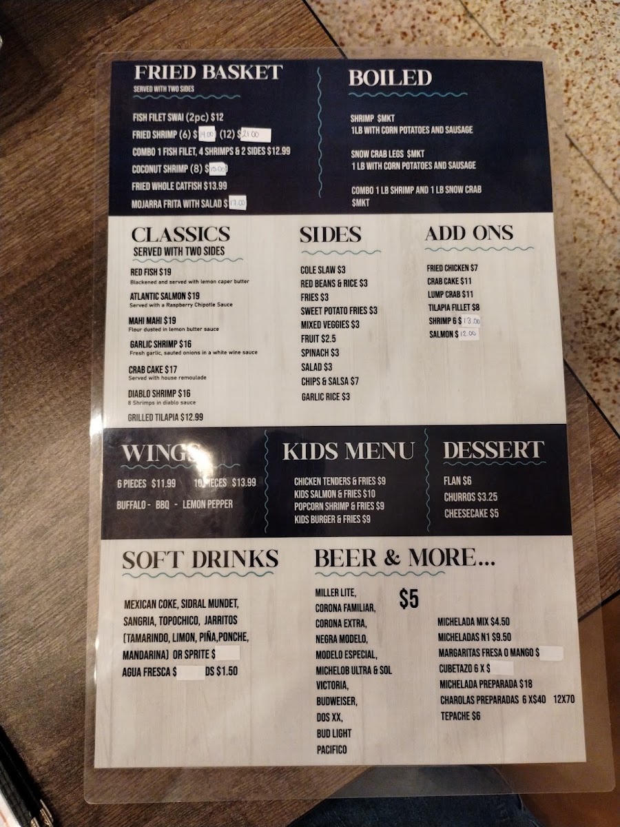 Birrieria Aguinaga menu board