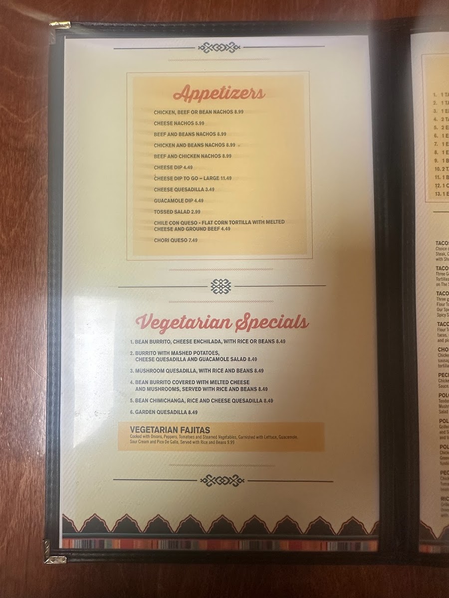 El Molcajete Mexican Restaurant menu board
